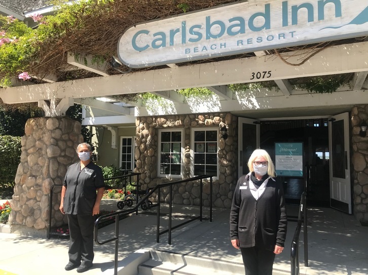 Gloria Perez. Karen Hansen. Carlsbad Inn entrance.